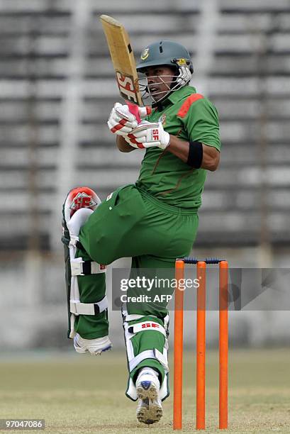 Bangladeshi cricketer Raqibul Hasan plays a shot during a practice match between a Bangladesh Cricket Board XI and England at The Khan Shaheb Osman...