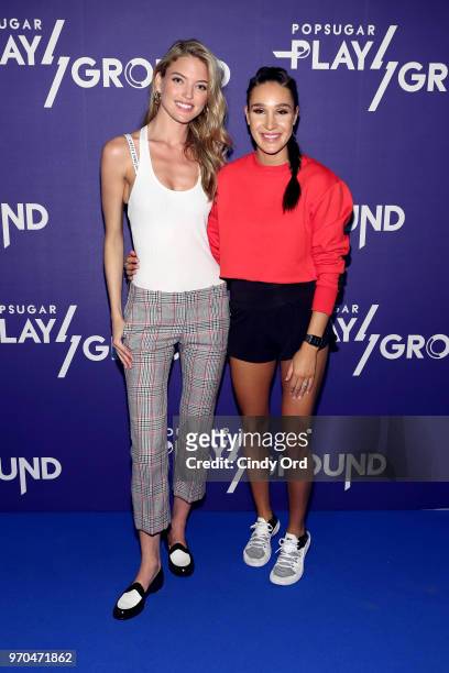 Model Martha Hunt and personal trainer Kayla Itsines attend day 1 of POPSUGAR Play/Ground on June 9, 2018 in New York City.