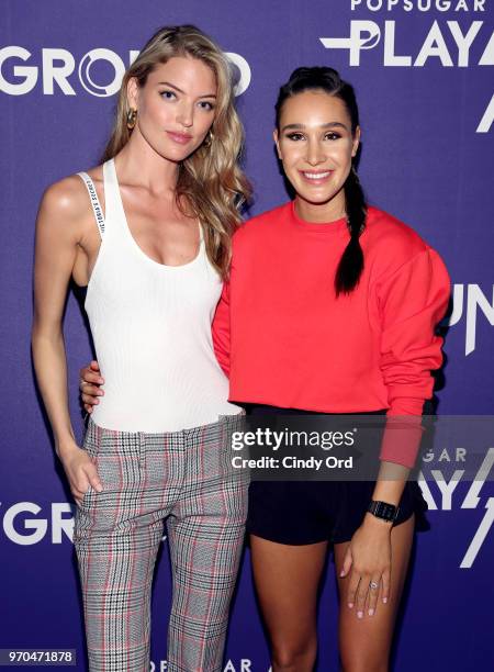 Model Martha Hunt and personal trainer Kayla Itsines attend day 1 of POPSUGAR Play/Ground on June 9, 2018 in New York City.