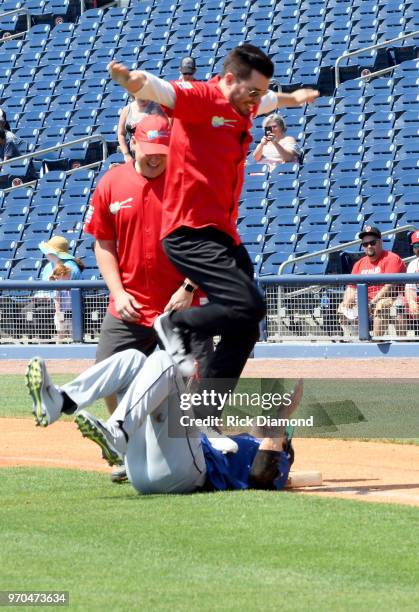 Jonathan Scott and Drew Scott participat in 28th Annual City of Hope Celebrity Softball Game on June 9, 2018 in Nashville, Tennessee.