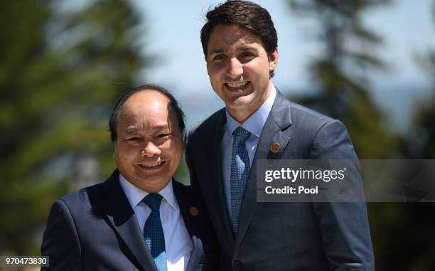 Vietnam's Prime Minister Nguyen Xuan Phuc meets Canada's Prime Minister Justin Trudeau at the G7 Outreach Official Welcome on day two of the G7...