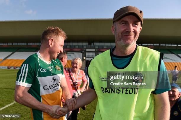 Tullamore , Ireland - 9 June 2018; Offaly manager Paul Rouse, right, is congratulated by Niall Darby of Offaly following the GAA Football All-Ireland...