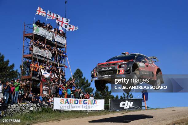 Ireland's Craig Breen and co-driver Britain's Scott Martin steer their Citroen C3 WRC during the Micky's Jumps at Monte Lerno, on the third day of...