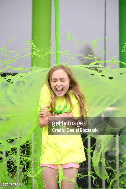 Young guests are getting slimed during Nickelodeon SlimeFest at Huntington Bank Pavilion at Northerly Island on June 9, 2018 in Chicago, Illinois.