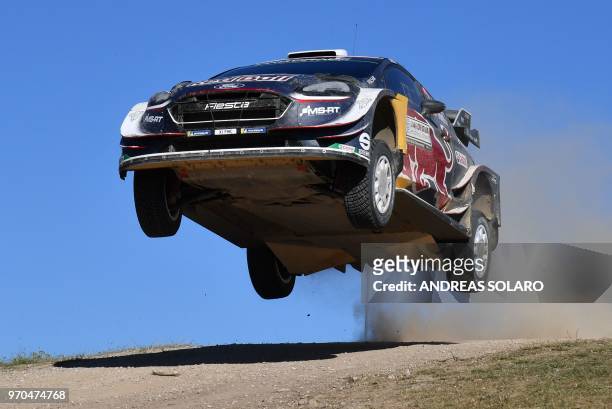 British driver Elfyn Evans and compatriot co-driver Daniel Barritt steer their Ford Fiesta WR, during the Micky's Jumps at Monte Lerno, on the third...