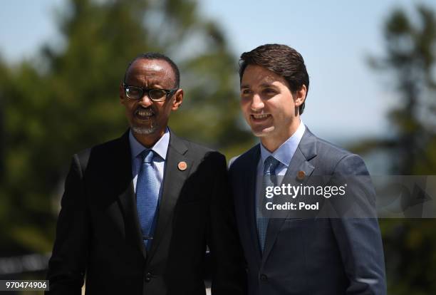 President of Rwanda Paul Kagame meets Canada's Prime Minister Justin Trudeau at the G7 Outreach Official Welcome on day two of the G7 Summit on June...