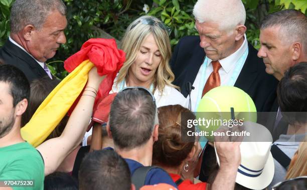 Nadia Comaneci is all smiles following the victory of countrywoman Simona Halep of Romania following the final on Day 14 of the 2018 French Open at...