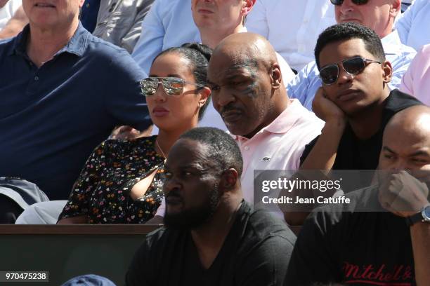 Mike Tyson and his wife Kiki Tyson during Day 12 of the 2018 French Open at Roland Garros stadium on June 7, 2018 in Paris, France.