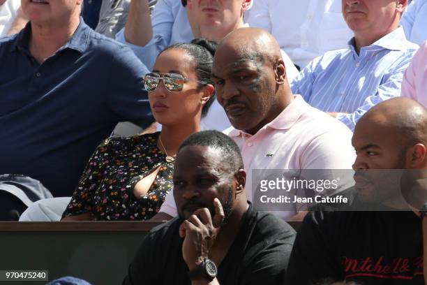 Mike Tyson and his wife Kiki Tyson during Day 12 of the 2018 French Open at Roland Garros stadium on June 7, 2018 in Paris, France.