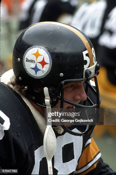 Linebacker Jack Lambert of the Pittsburgh Steelers looks on from the sideline during a game against the Seattle Seahawks at Three Rivers Stadium on...