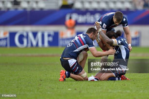American players react after winning the match between England and the United States Of America at the HSBC Paris Sevens, stage of the Rugby Sevens...