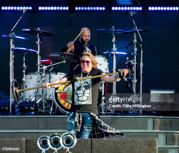 Frank Ferrer and Axl Rose of Guns N Roses performs onstage on Day 2 of the Download Festival at Donington Park on June 9, 2018 in Donington, England.