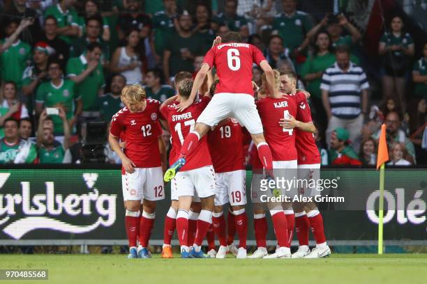 Yussuf Poulsen of Denmark celebrates his team's first goal with team mates during the international friendly match between Denmark and Mexico ahead...