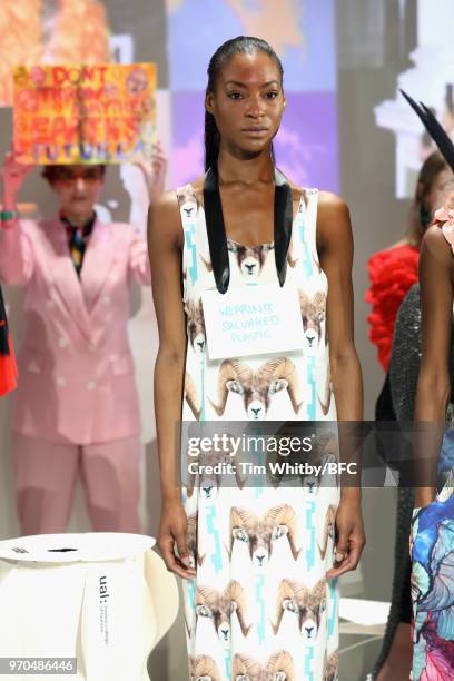 Model poses during the VIN + OMI press launch at London Fashion Week Men's June 2018 at 180 The Strand on June 9, 2018 in London, England.