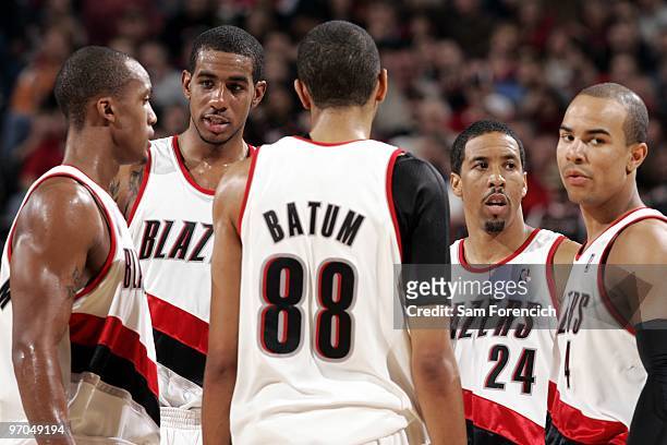 Dante Cunningham, LaMarcus Aldridge, Nicolas Batum, Andre Miller and Jerryd Bayless of the Portland Trail Blazers huddle on the court during the game...