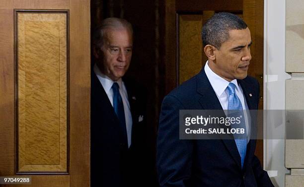 President Barack Obama arrives with Vice President Joe Biden as he hosts a bipartisan meeting with members of Congress to discuss health reform...