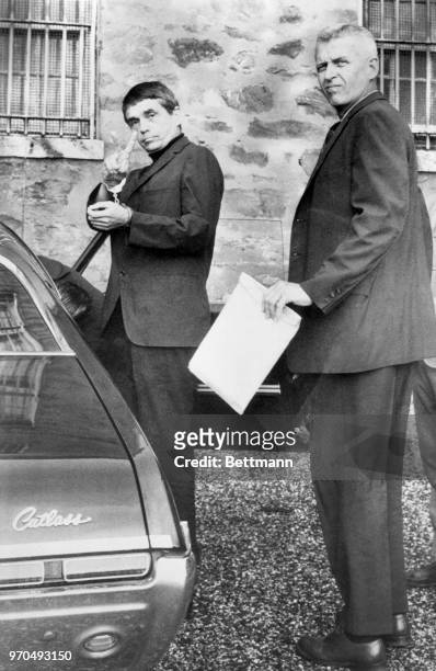 Leaving the Baltimore County Jail on their way to trial in Federal Court are the Rev. Daniel Berrigan , and his brother, the Rev. Philip Berrigan....