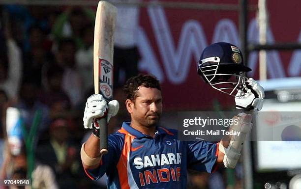 Sachin Tendulkar celebrates his epic knock of 200 not out against South Africa in Gwalior on Wednesday, February 24, 2010.