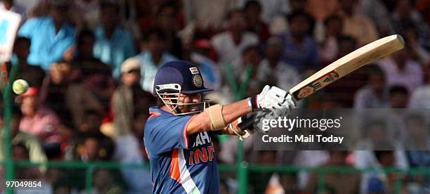 Sachin Tendulkar celebrates his epic knock of 200 not out against South Africa in Gwalior on Wednesday, February 24, 2010.