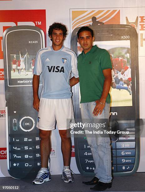 Argentine hockey players Lucas Rey and India's Deepak Thakur at a press conference in Delhi to accounce Indian Cellular Phone manufacturer Karbonn's...