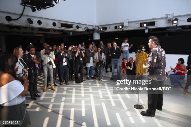 Vin of VIN + OMI speaks at the VIN + OMI press launch during London Fashion Week Men's June 2018 at 180 The Strand on June 9, 2018 in London, England.