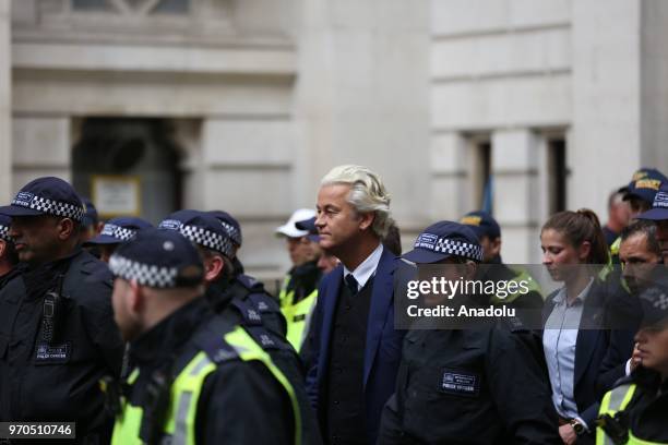 Dutch right-wing 'Partij voor de Vrijheid' leader Geert Wilders is escorted by police after delivering a speech at a rally in support of British...