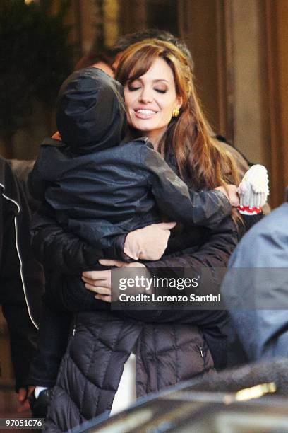 Actress Angelina Jolie and her son Maddox as she films in Place des Victoires of Paris for the Movie "The Tourist" on February 25, 2010 in Paris,...