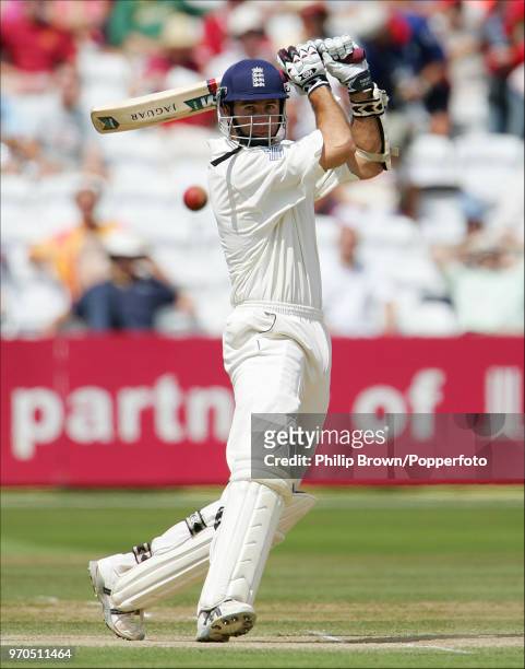 England captain Michael Vaughan hits out during his innings of 101 not out in the 1st Test match between England and West Indies at Lord's Cricket...