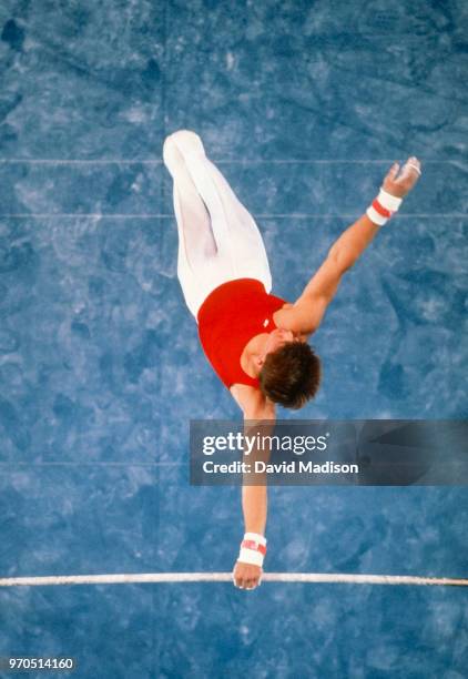 Chris Waller of the United States competes on the high bar during the gymnastics event of the 1989 United States Olympic Festival held during July...