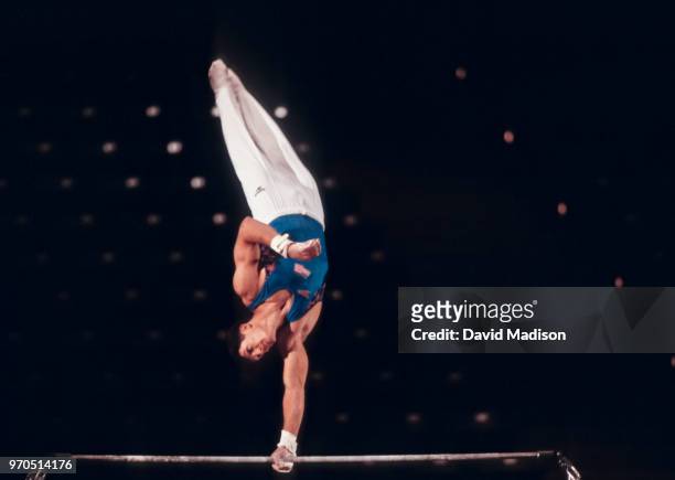 John Roethlisberger of the United States competes on the high bar during the San Jose Gymnastics Spectacular held on July 18, 1993 in the Event...