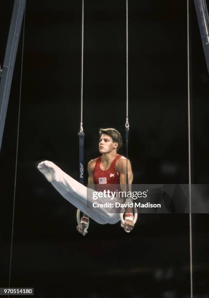 Chris Waller of the United States performs on the still rings during the gymnastics competition of the 1990 Goodwill Games held from July 20 The...