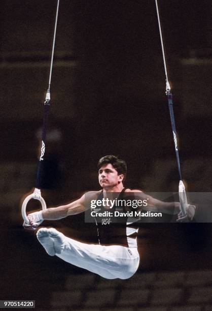 Chris Waller of the United States performs on the still rings during the Budget Rent A Car Invitational Gymnastics Meet held on July 17, 1995 at the...