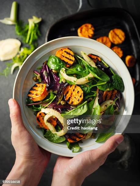 healthy grilled sweet potato fennel salad - haoliang stock pictures, royalty-free photos & images