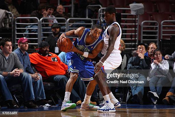 Wayne Ellington of the Minnesota Timberwolves handles the ball against Royal Ivey of the Philadelphia 76ers during the game on February 9, 2010 at...