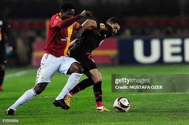 Simao of Atletico Madrid competes with Galatasaray's Kader Keita during the UEFA Europa League football match at Ali Sami Yen Stadium in Istanbul on...