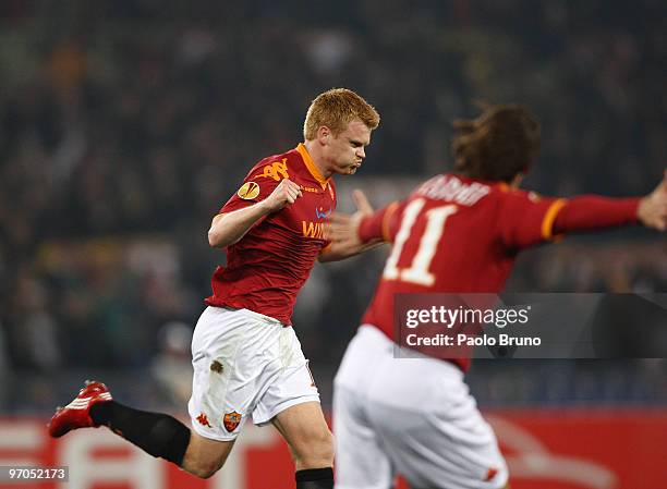 John Arne Riise of AS Roma celebrates scoring the opening goal during the UEFA Europa League Round of 32, 2nd leg match between AS Roma and...