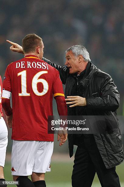 Claudio Ranieri the coach of AS Roma gestures with Daniele De Rossi during the UEFA Europa League Round of 32, 2nd leg match between AS Roma and...