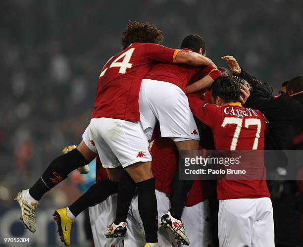 John Arne Riise with his teammates of AS Roma celebrates the opening goal during the UEFA Europa League Round of 32, 2nd leg match between AS Roma...