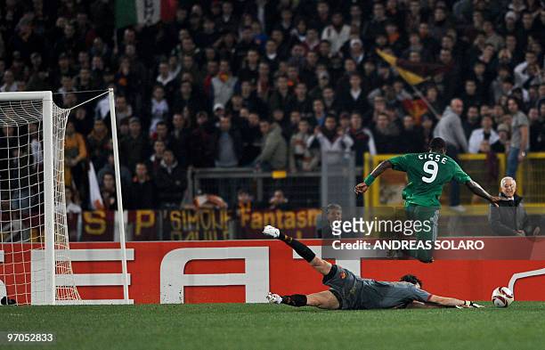 Panathinaikos French forward Djibril Cisse jumps for the ball and scores against AS Roma during their UEFA Europa League football match on February...