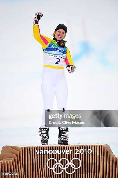 Viktoria Rebensburg of Germany celebrates winning the gold medal during the flower ceremony for the Ladies Giant Slalom on day 14 of the Vancouver...