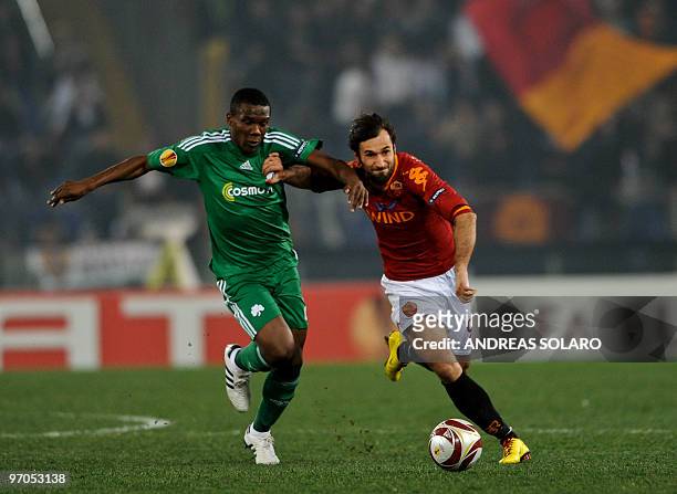 Roma's forward Mirko Vucinic of Serbia Montenegro fights for the ball against a Panathinaikos player during their UEFA Europa League football match...