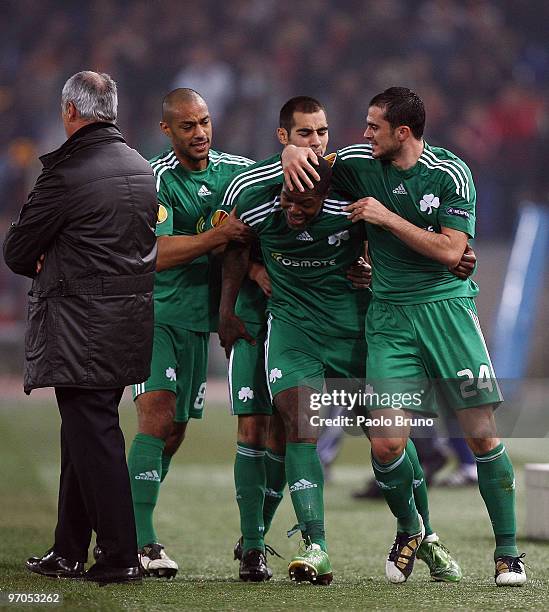 Djibril Cisse' with his teammates of Panathinaikos celebrates the third goal as Claudio Ranieri the coach of AS Roma looks on during the UEFA Europa...