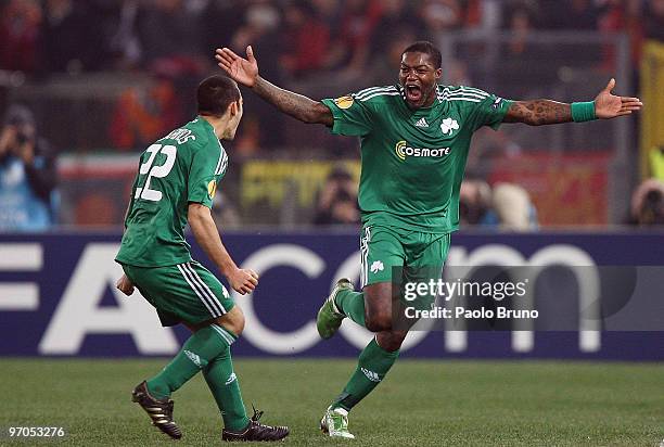 Djibril Cisse' and Stergos Marinos of Panathinaikos celebrate the third goal during the UEFA Europa League Round of 32, 2nd leg match between AS Roma...
