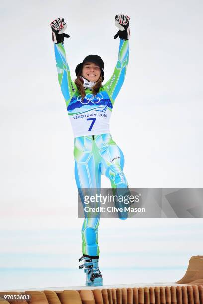 Tina Maze of Slovenia celebrates winning the silver medal during the flower ceremony for the Ladies Giant Slalom on day 14 of the Vancouver 2010...
