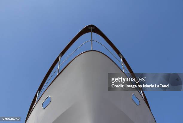 bow of a luxury yacht - schiffsbug stock-fotos und bilder