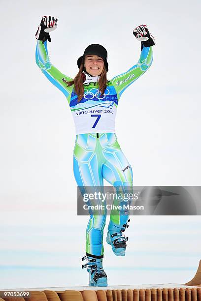 Tina Maze of Slovenia celebrates winning the silver medal during the flower ceremony for the Ladies Giant Slalom on day 14 of the Vancouver 2010...