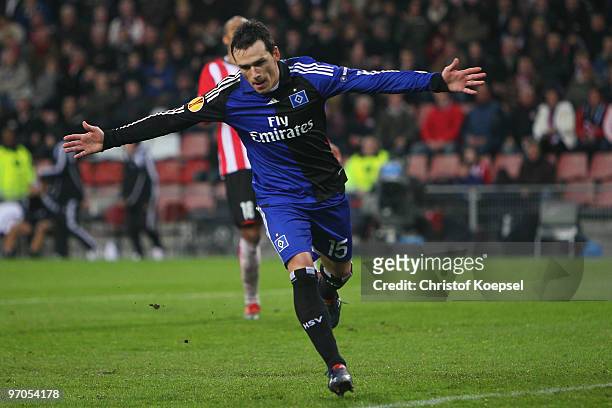 Piotr Trochowski celebrates his team's second goal during the UEFA Europa League knock-out round, first leg match between PSV Eindhoven and Hamburger...