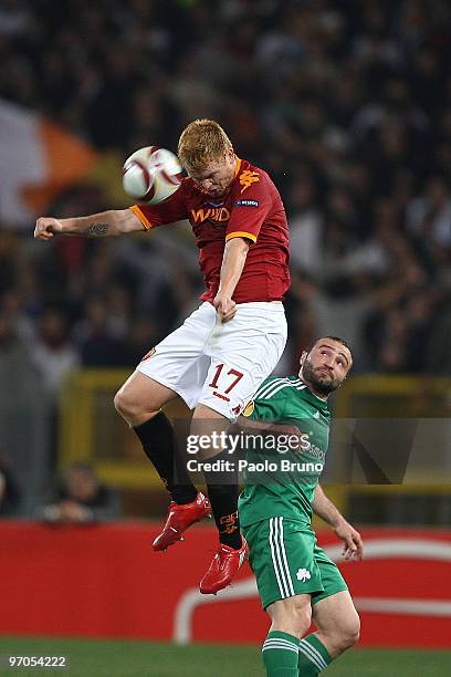 John Arne Riise of AS Roma and Dimitris Salpingidis of Panathinaikos in action during the UEFA Europa League Round of 32, 2nd leg match between AS...