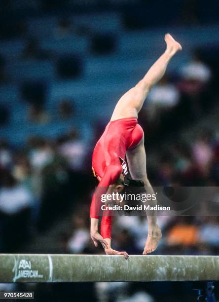 Li Li of China competes in the balance beam event of the gymnastics competition of the 1990 Goodwill Games held from July 20 The gymnastics venue was...