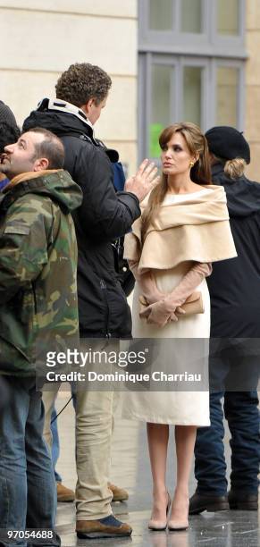 Actress Angelina Jolie and Director Florian Henckel von Donnersmarck films in Place des Victoires of Paris for the Movie 'The Tourist' on February...